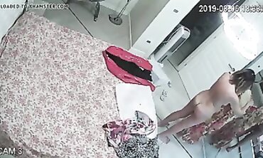 Honey MILF Caught on Hidden Cam Changing in Apartment