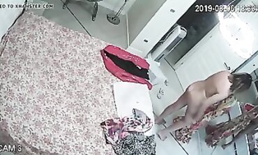 Honey MILF Caught on Hidden Cam Changing in Apartment
