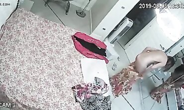 Honey MILF Caught on Hidden Cam Changing in Apartment