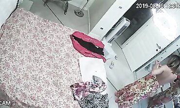 Honey MILF Caught on Hidden Cam Changing in Apartment