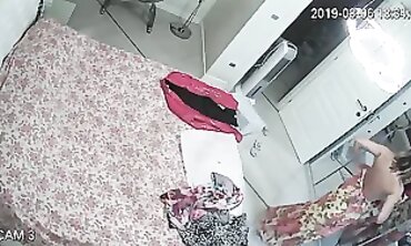 Honey MILF Caught on Hidden Cam Changing in Apartment