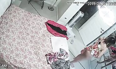 Honey MILF Caught on Hidden Cam Changing in Apartment