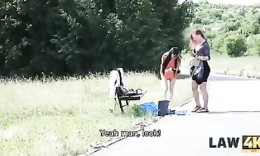 Rough Brunette Cop Gives Skinny Outlaw a Filthy Blowjob