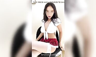 Katya's College Striptease in Sexy Outfit
