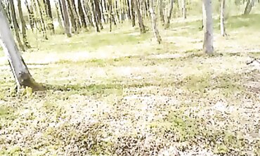 MILF Betty Johnson Gives a Blowjob to Her Friend in the Woods