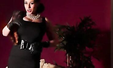 Donna Ambrose Strips in Stockings and Stilettos