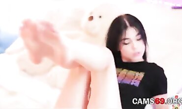 Legal Brunette Cutie Masturbates on Sofa for Webcam