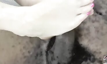 Lacey Starr Gives a Greasy Interracial Footjob