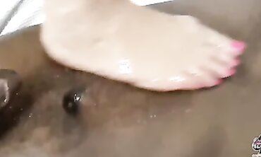 Lacey Starr Gives a Greasy Interracial Footjob