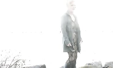 Mature Flasher Shows Off Lace Bodysuit On Boardwalk
