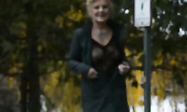 Mature Flasher Shows Off Lace Bodysuit On Boardwalk