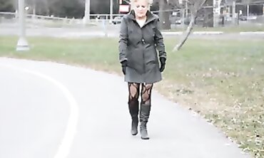 Mature Flasher Shows Off Lace Bodysuit On Boardwalk