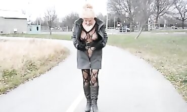 Mature Flasher Shows Off Lace Bodysuit On Boardwalk