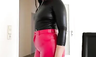 Red Shows Off Her Tight Leather Pants and Big Ass