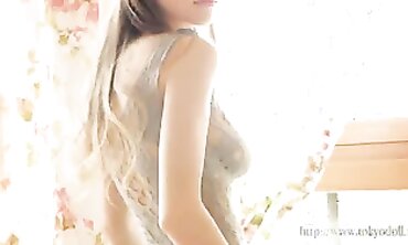Mila Azul Strips Her Enormous Boobs