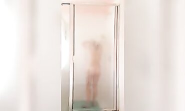 Redhead MILF Teases With Shower Masturbation