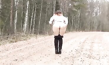 Huge Russian MILF Brunette Shows Off Massive Booty On The Street