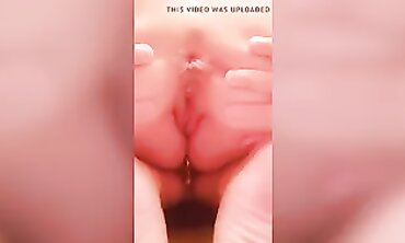 Close-Up of a Horny MILF Spreading Her Hole While Chatting
