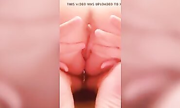 Close-Up of a Horny MILF Spreading Her Hole While Chatting