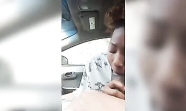 Ebony MILF Takes Amateur Blowjob in Dark Car Outdoors