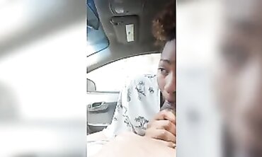 Ebony MILF Takes Amateur Blowjob in Dark Car Outdoors