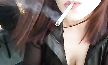 Brunette Smokes in Tight Leather Stretch Pants
