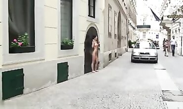 Bare Brunette Striptease on the Streets of Vienna
