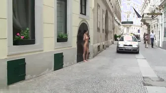Bare Brunette Striptease on the Streets of Vienna