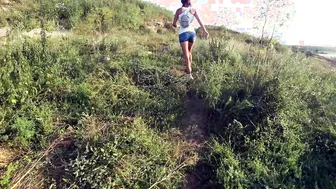 Czech Milf in White Tee and Denim Cut-offs Walking by the Sea