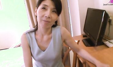 Experienced Asian with long black hair Chiduru Tamiya fucks with a young guy