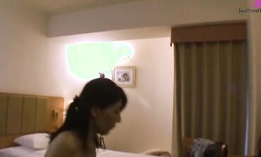 Experienced Asian with long black hair Chiduru Tamiya fucks with a young guy