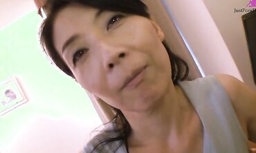 Experienced Asian with long black hair Chiduru Tamiya fucks with a young guy
