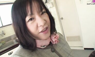 Mature Asian brunette with very hairy pussy Makiko Nakane having fun with a guy