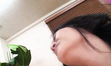 Asian brunette Jun and her girlfriend fuck a guy on a mattress in the middle of the room