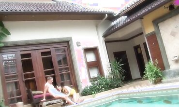 A young girl thanked the guy for the rest and was fucked hard near the pool