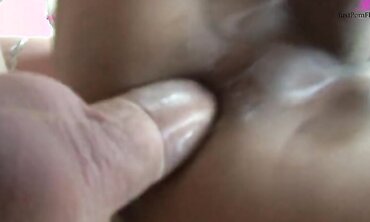 Thai Tranny Annie Takes A Double Load Of Spunk On Pierced Belly