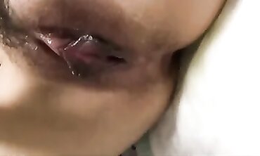 Hairy Asian Babe Squirts While Fingering Herself