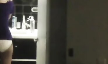 Busty Brunette MILF Caught by Motel Window