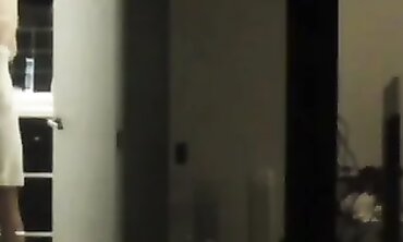 Busty Brunette MILF Caught by Motel Window