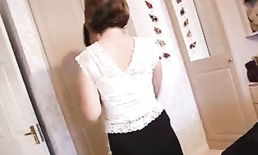 Hot Babe in Fishnet Stocks Gives an Erotic Dance Performance
