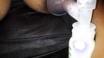 Dark-Hued Beauty Pumping Milk From Her Lush Breasts