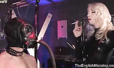 British Goddess in Latex Smokes and Masturbates