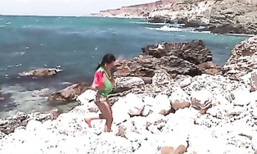 Merilyn Sakova Shows Off Her Huge Natural Tits on the Seashore