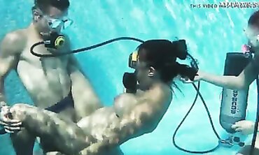 Candy and Lizzy Pounding Mike Underwater