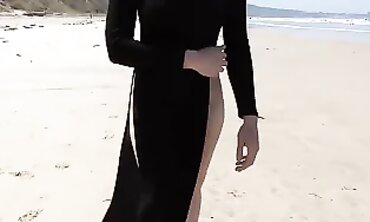 May Flashes in African Sundress at the Beach