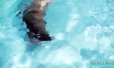 Dark-Haired Candy Shows Off Big Tits Underwater