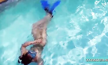 Dark-Haired Candy Shows Off Big Tits Underwater
