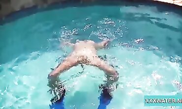 Dark-Haired Candy Shows Off Big Tits Underwater
