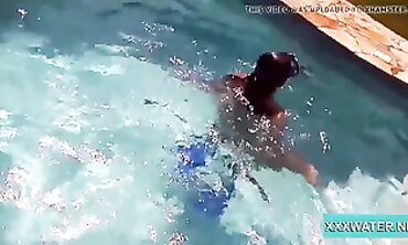 Dark-Haired Candy Shows Off Big Tits Underwater