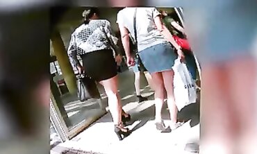 Princess in a Taut Black Micro-Skirt and Nude Pantyhose